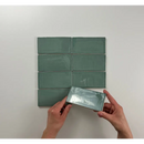 Sage green Atlas Jade Brillo ceramic tiles in a stylish rectangular pattern