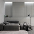 Moderne grijze modulaire sofa met kussens en plaid, perfect voor Grace Grey Gloss