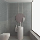 Cylindrische witte wastafel met ronde spiegel boven Sweet Bars Mineral Grey 12,5x25
