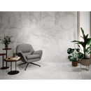 Grijze draaistoel met zwarte metalen poten en comfortabele zitting, geïnspireerd door Vitra, perfect voor Onix Wit Mat 60x120 Rett