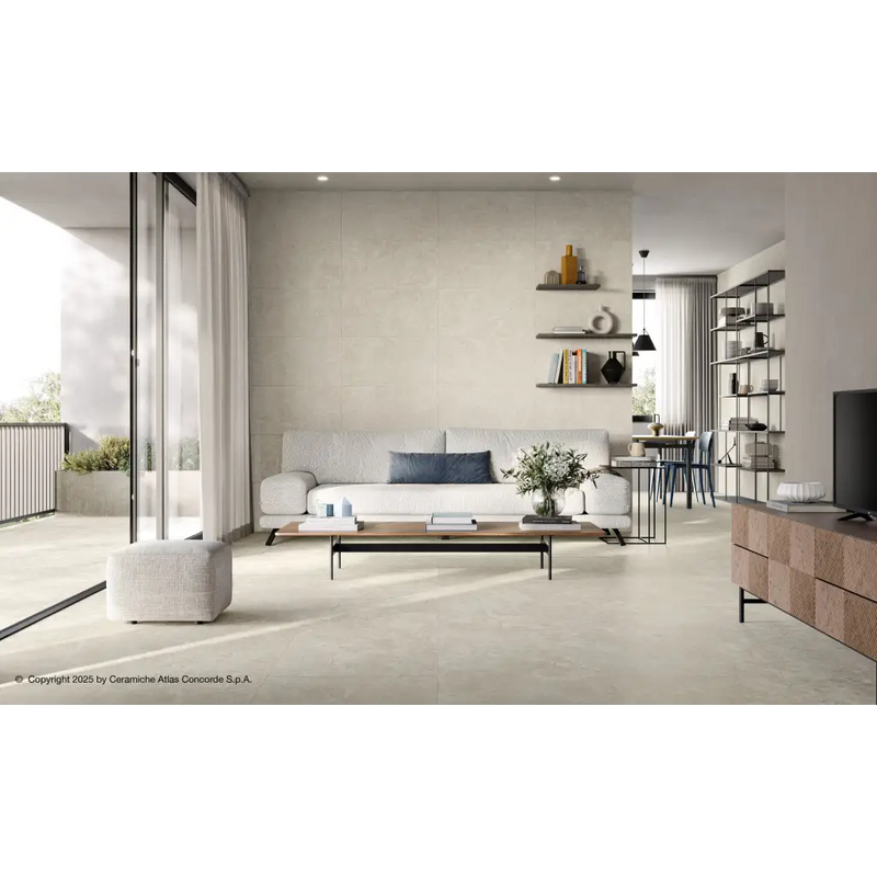 Witte moderne bank met zwarte metalen poten en blauwe kussen, Duolith Wool 60x60 rett