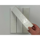 Witte glanzende tegels wit glans 6x24,6 met textuurrijke keramische afwerking