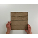 Bruine keramische Alchimia Vision 7,5x30 in een gevouwen papieren zak