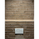 Cirkulaire dubbele flushplaat op bruine tegels van Alchimia Vision 7,5x30