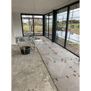 Vloerruimtes in een raster op beton met Ambiente Nut Mat 90 x 90 Rett