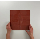 Acht prachtig Atlas Garnet Brillo tegels in een baksteenpatroon