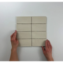 Acht witte rechthoekige tegels in een raster voor de Atlas Vision Mate 7,5x15