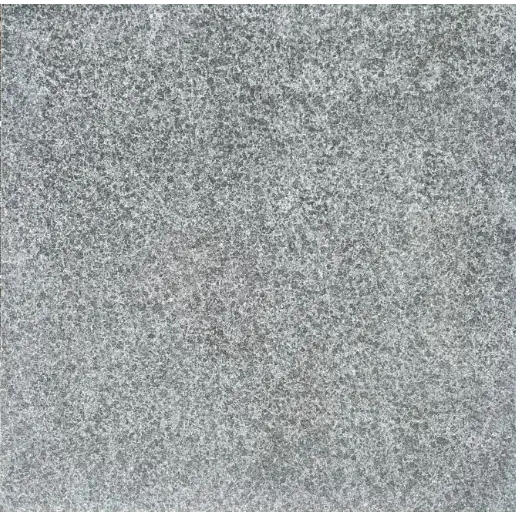 Mottled speckled grey granite surface of Basalto 60x60x3 keramisch tegel