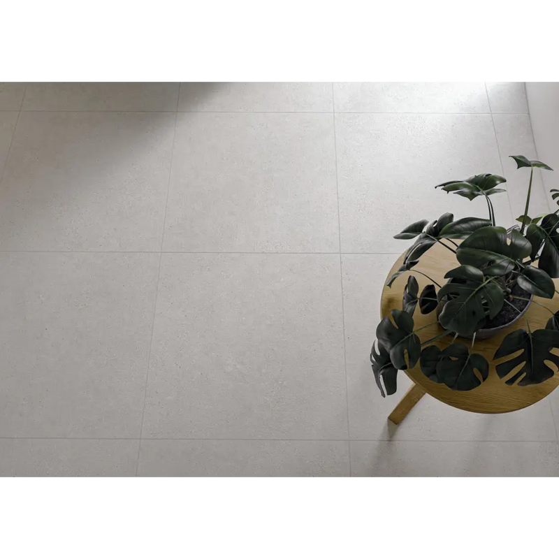 Monstera plant in yellow spherical planter on Borneo Pearl anti-slip R11 60x60 rett