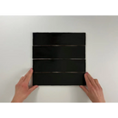 Zwart rechthoekig paneel met groeven, onderdeel van de Colonial Black mat 7,5x30