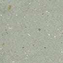 Grey terrazzo surface with colorful flecks, perfect for Croccante Menta 60x60 tegels