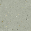 Grijs terrazzo oppervlak met kleurige steentjes, perfect voor Croccante Menta 60x60