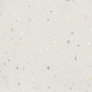 Speckled off-white terrazzo surface with gray fragments in Croccante Tutti Frutti 60x60