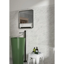 Sage green freestanding pedestal sink with matte black faucet on Exigo Carrara mat 30x60 rett
