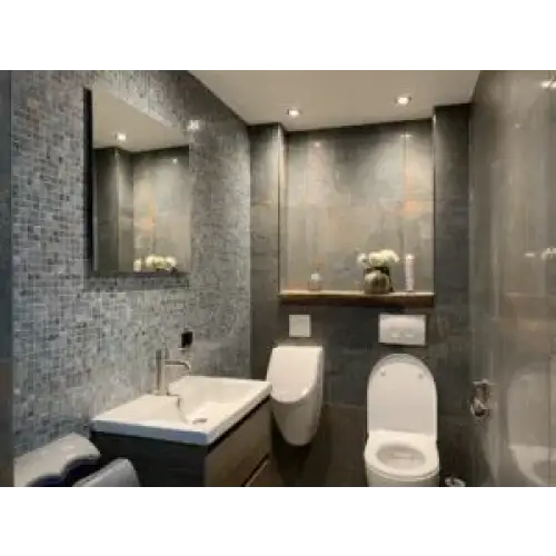 Moderne badkamer met gmg651 medium grey gouden ader wandtegels en witte sanitair