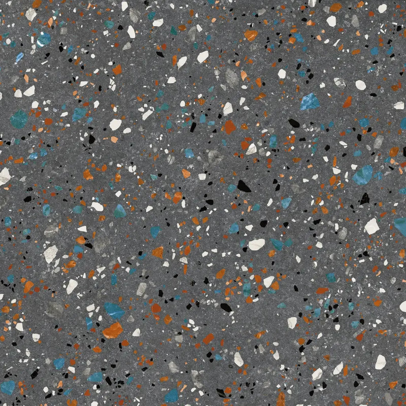 Speckled Gobi Nero 60x60 terrazzo pattern with blue, orange, and black on grey cement