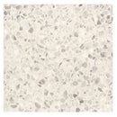 Terrazzo patroon met lichtbeige basis en grijze steentjes in Granito Ferrara 40x40