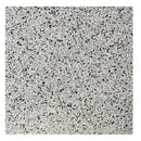 Speckled grey granite surface with black minerals in Granito Treviso 40x40 cm