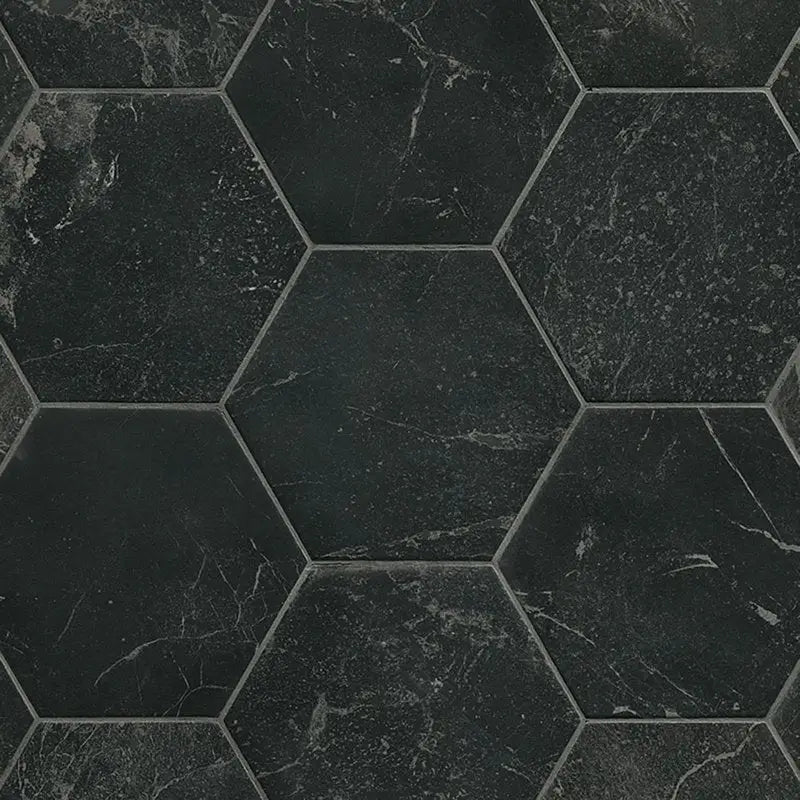 Donkere hexagonale tegels met verweerde marmerlook van Hexagon Roma Grafite mat 21,6x25