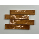 Vier bruine Kalon Terracotta wandtegels 5x25 glans met witte distressed markeringen