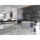 Modern vrijstaand bad met een strakke witte afwerking tegen een muur van lixium grey grey gepolijst 120x120 rett