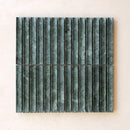 Dark green vertically ribbed mosaic tile panel with textured stone finish in lulu indian green kitkat style