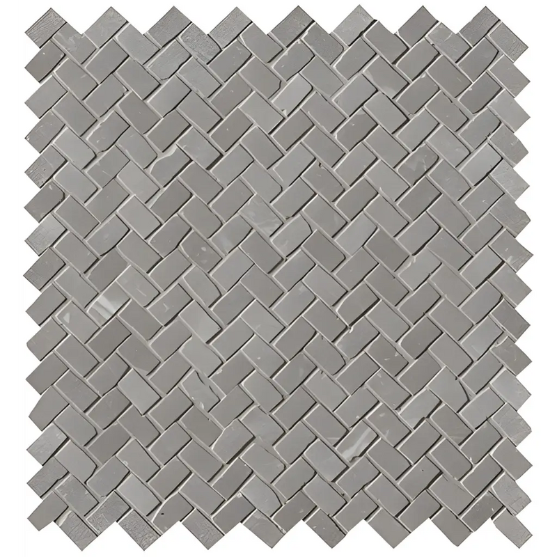 Grijze steenmosaic tegels in een herringbone patroon van Maku Grey Spina