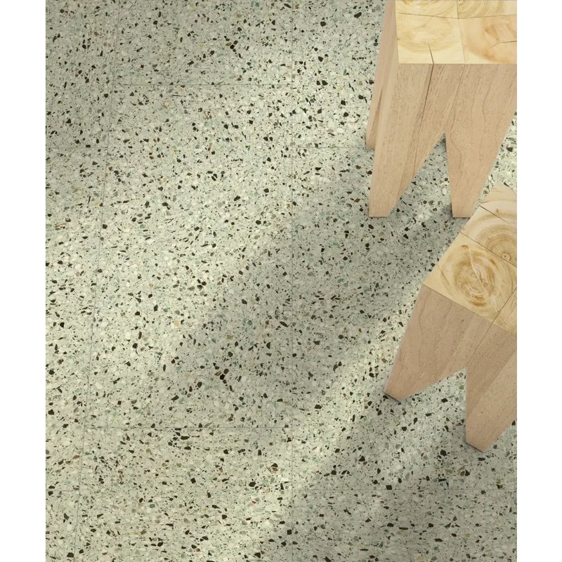 Lichte groene Medley Terrazzo Leaf 60x60 rett vloer met donkere vlekjes