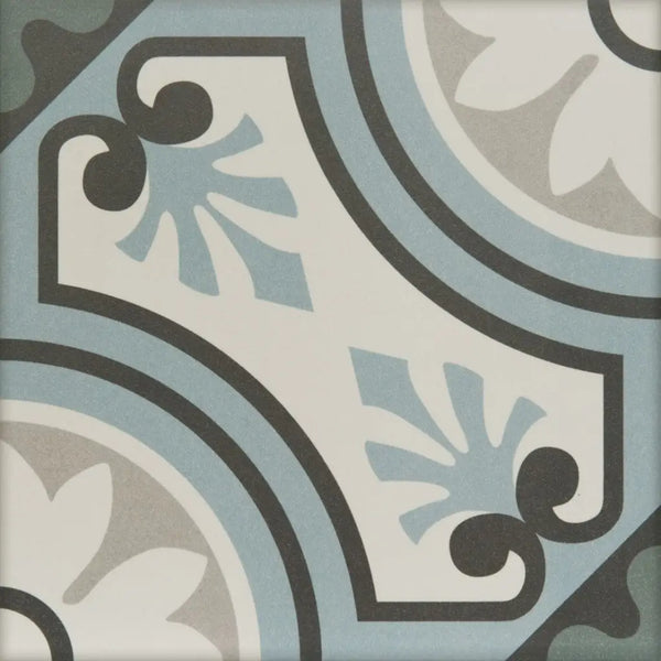 Decoratieve tegel met bloemenpatroon in blauw, grijs en zwart uit de collectie 20x20 tegels