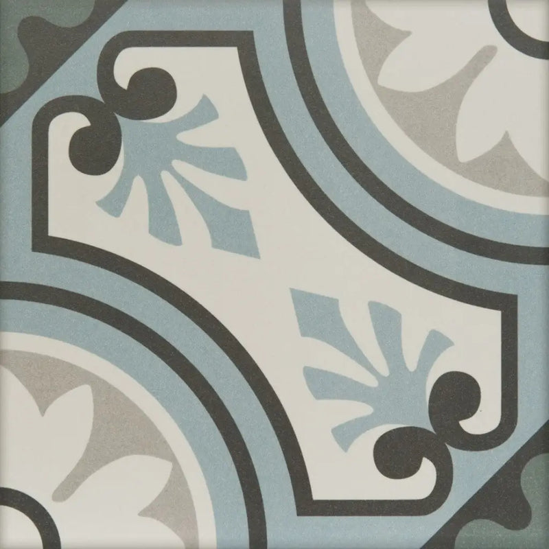 Decoratieve tegel met bloemenpatroon in blauw, grijs en zwart uit de collectie 20x20 tegels