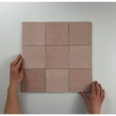 Negen roze Moos Pink glans handvorm tegels in een vierkant 13x13 patroon