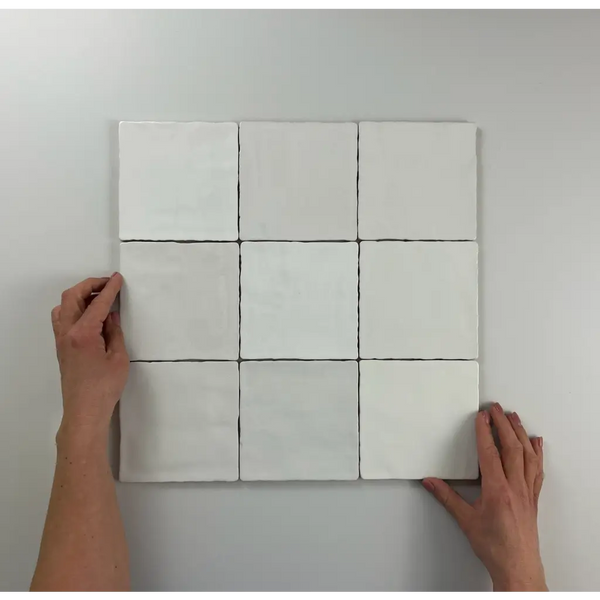 Negen witte vierkanten in een 3x3 grid van Moos White glans handvorm 13x13