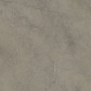 Grey concrete surface with cracks, perfect for Munich Taupe 120x120 anti-slip