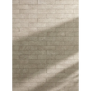 Beige brick wall with diagonal shadows, perfect for Nobu Grey 6x24 style