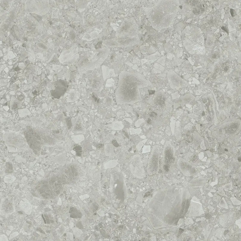 Grijs terrazzo oppervlak van Nover Steel 60x60 rett met een gemêleerd patroon