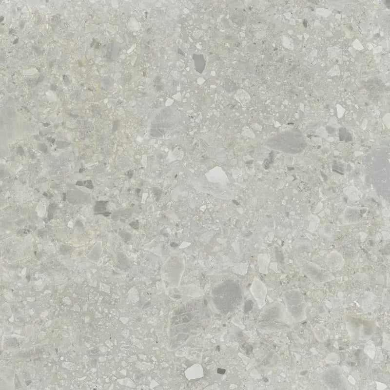 Speckled grey terrazzo surface of Nover Steel 80x80 rett with unique aggregate