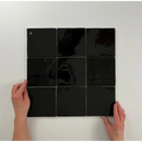 Glossy black Oud Hollandse Witjes Zwart 13x13 in a stylish square grid pattern