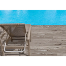 Woven rattan lounge chair on Padouk Grey 20x120 decking for a verweerd uiterlijk