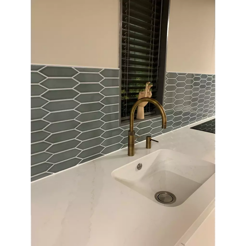 Brass gooseneck faucet with modern design, perfect for Mosaic Factory’s PAPIC82 groen grijs