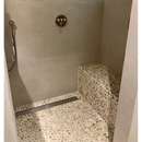 Mosaic stone pebbles crema 30x30 shower floor with built-in bench for a stylish look