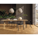 Moderne houten eettafel met schuine poten en zwarte stoelen, Plein Air Gold 20x180 rett