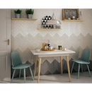 Witte tafel met houten poten en teal stoelen bij Premium Countri Gris Claro 5x20 glans