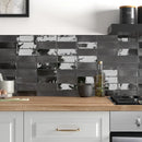 Glossy Koko Black Hat 5x15 tiles make a sleek modern kitchen backsplash