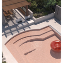 Curved concrete steps in Premium Koko Orchard Pink finish for stylish outdoor spaces