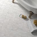 Premium Koko White 5x15 mat with stylish white mosaic tile flooring in basketweave