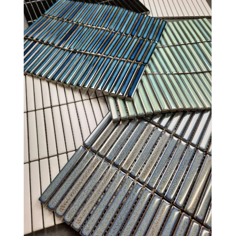 Metallic mosaic tiles in grey blue speckle with blue and green patterns