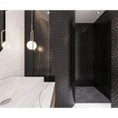 Moderne badkamer met zwarte matte vloertegels en stijlvolle hanglampen