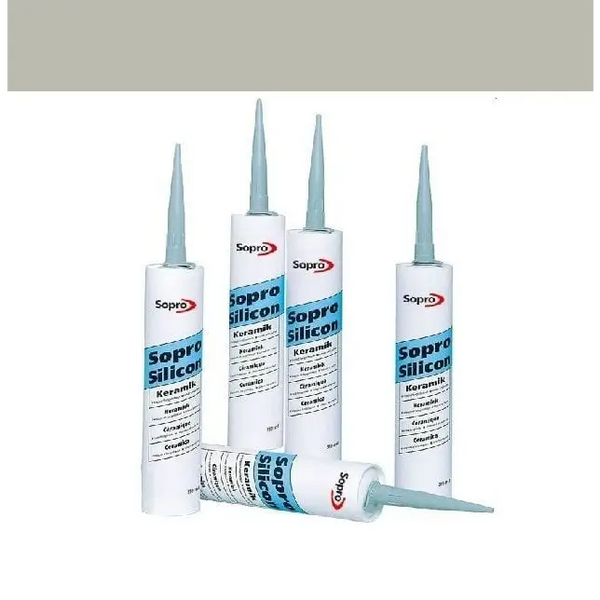 Witte silicone sealant tubes met blauwe tips in Sopro Silicone kit Grijs nr. 15