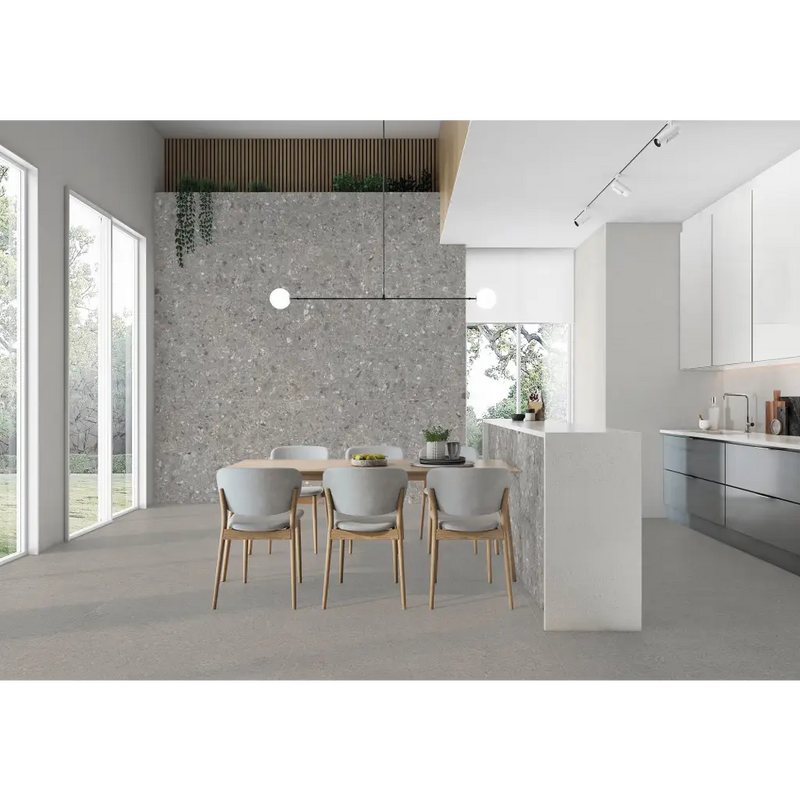 Moderne open-plan keuken met grijze terrazzo-wanden in Stone Grey 60x120 rett