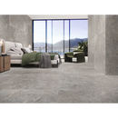 Moderne slaapkamer met Stoneland Grey mat 60x60 rett en groen beddengoed